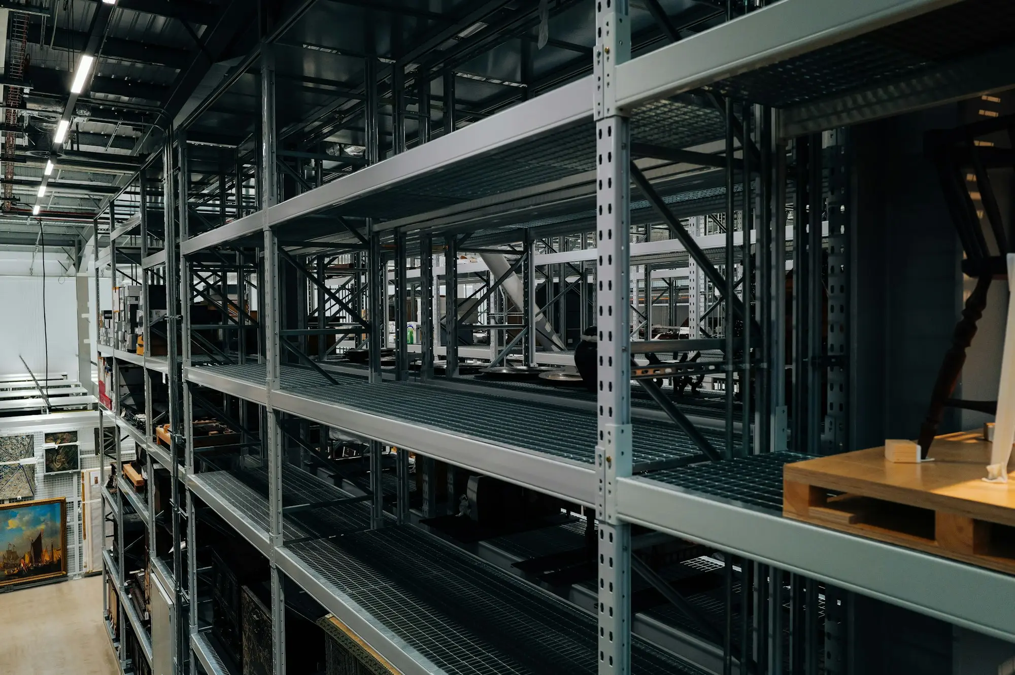 Empty metal shelving racks ready to fit out a van or storeroom